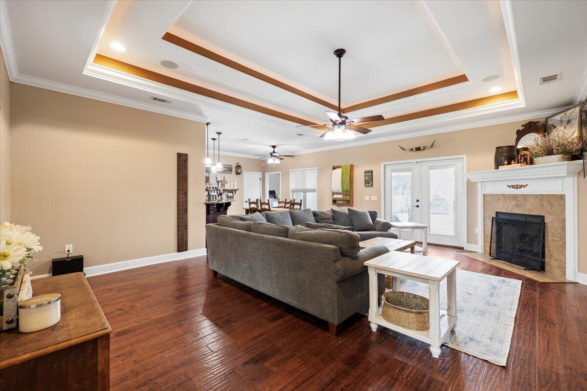 7938 Steel Mill Creek Road Laurel Hill, FL 32567 - Photo 5 of 33 a living room with furniture and a fireplace