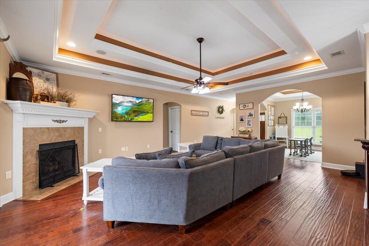 7938 Steel Mill Creek Road Laurel Hill, FL 32567 - Photo 6 of 33 a living room with furniture and a fireplace