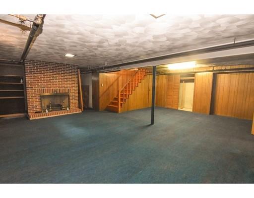 50 Ripley Road Medford, MA 02155 - Photo 11 of 16 a view of an empty room with a fireplace