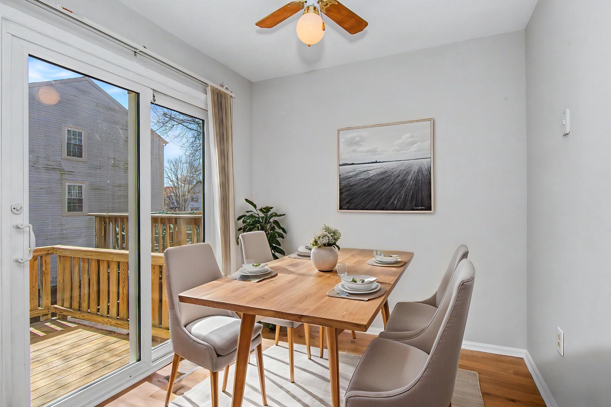 13993 Gunners Place Centreville, VA 20121 - Photo 20 of 43 a view of a dining room with furniture wooden floor and chandelier