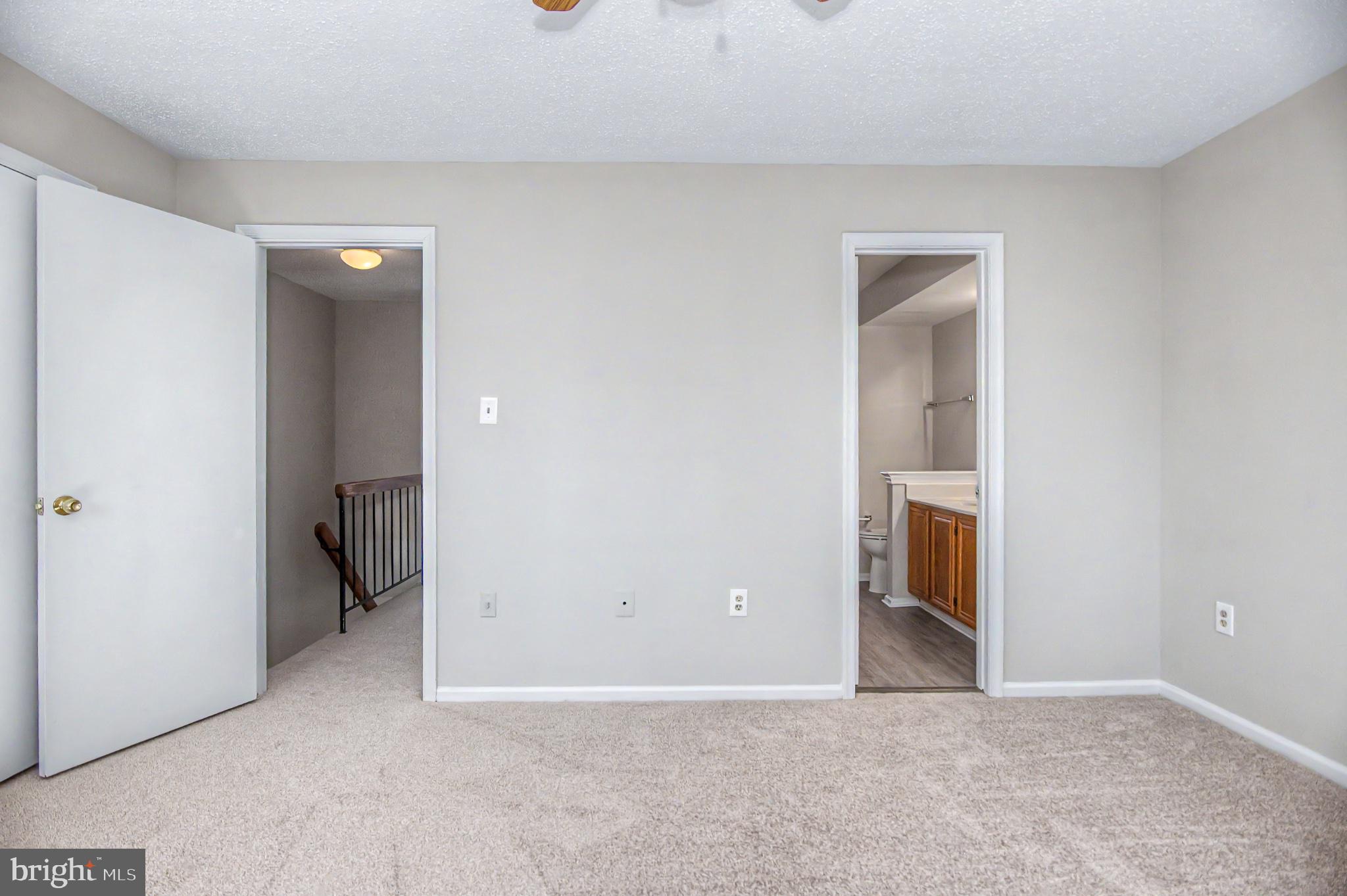13993 Gunners Place Centreville, VA 20121 - Photo 27 of 43 a view of an empty room and closet
