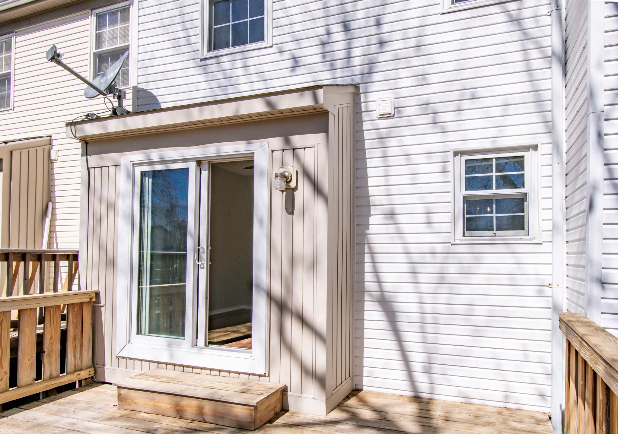13993 Gunners Place Centreville, VA 20121 - Photo 39 of 43 a view of a brick house with a window