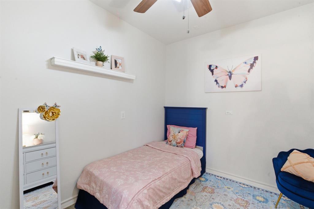405 Zion Hill Road Weatherford, TX 76088 - Photo 27 of 38 Bedroom featuring a ceiling fan and baseboards