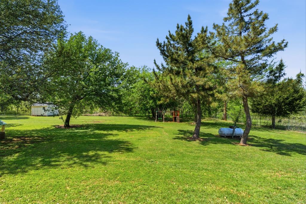 405 Zion Hill Road Weatherford, TX 76088 - Photo 6 of 38 View of grassy yard