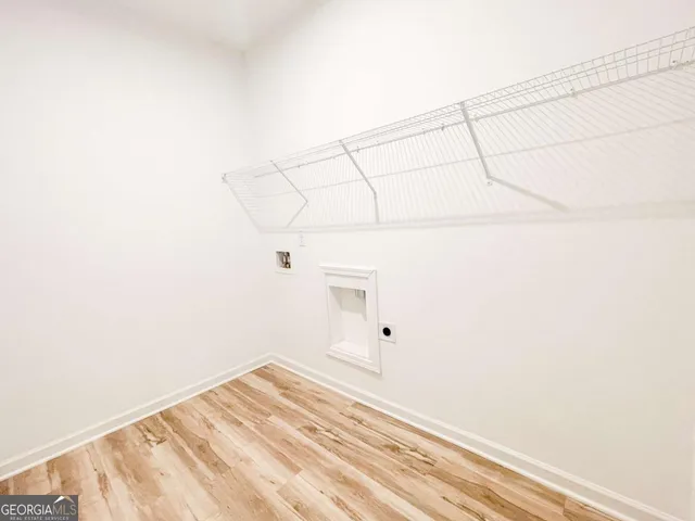 a view of a room with racks on the wall