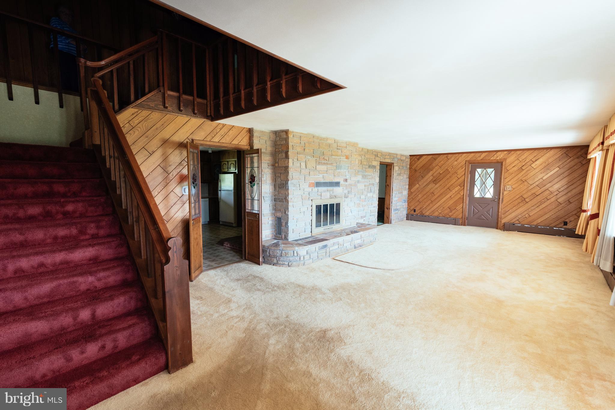 16600 York Road Monkton, MD 21111 - Photo 4 of 30 a view of an empty room with wooden floor and stairs