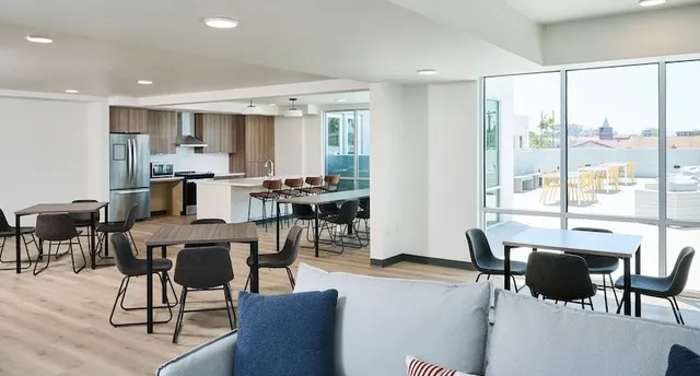 a view of a dining room with furniture window and outside view