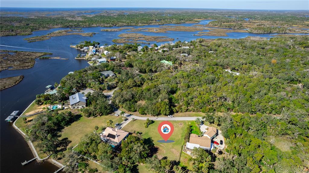 12214 West Restview Court Homosassa, FL 34448 - Photo 5 of 19 an aerial view of a house with a garden