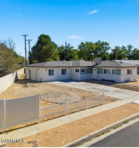 a view of a house with a swimming pool