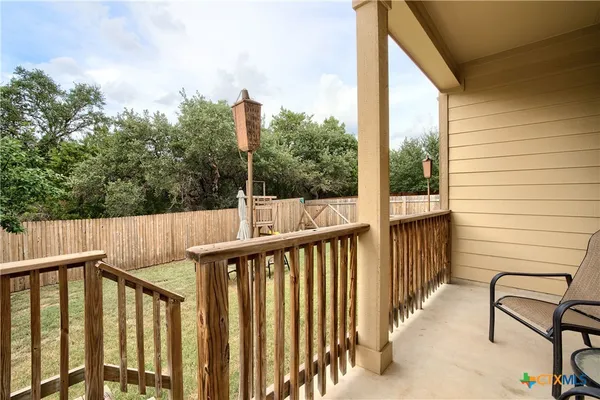 a view of a chair in the balcony