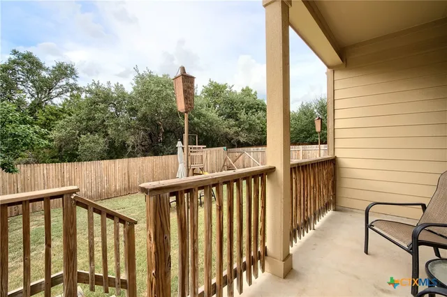 a view of a chair in the balcony