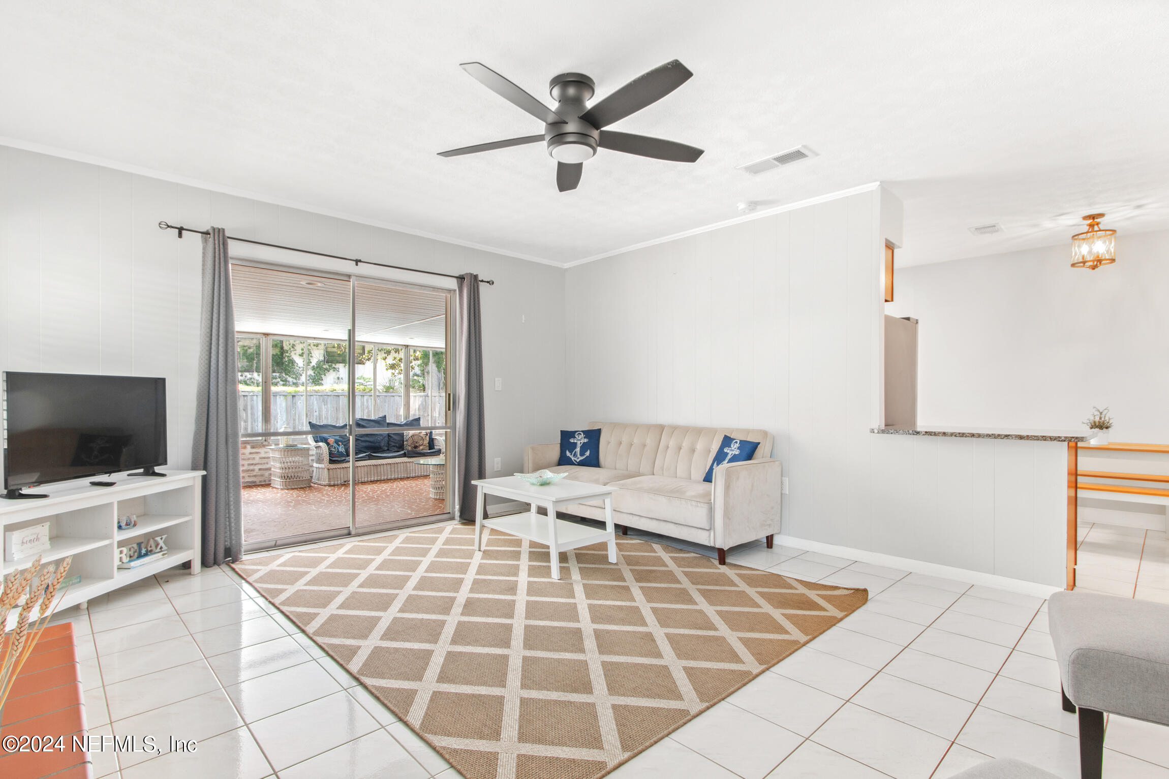 14 Park Terrace Drive St. Augustine, FL 32080 - Photo 14 of 42 a living room with furniture and flat screen tv