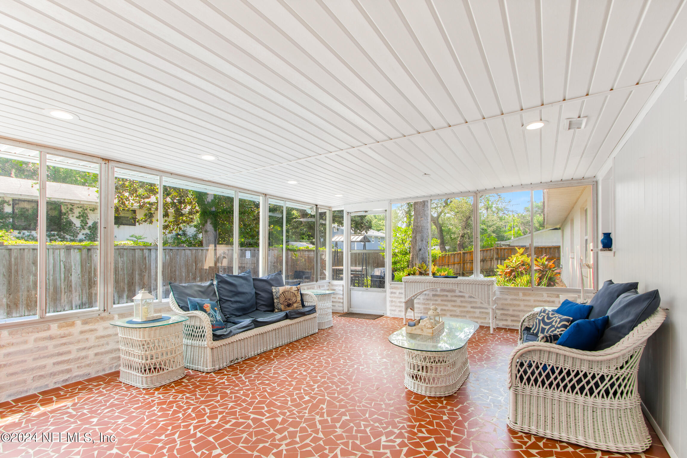 14 Park Terrace Drive St. Augustine, FL 32080 - Photo 18 of 42 a living room with furniture and a large window