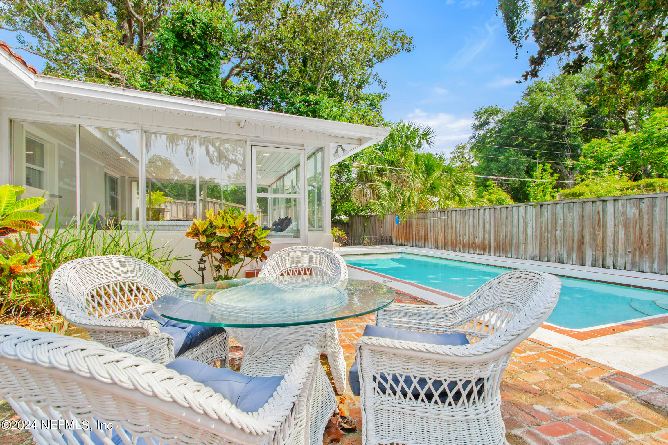 14 Park Terrace Drive St. Augustine, FL 32080 - Photo 19 of 42 a backyard of a house with table and chairs