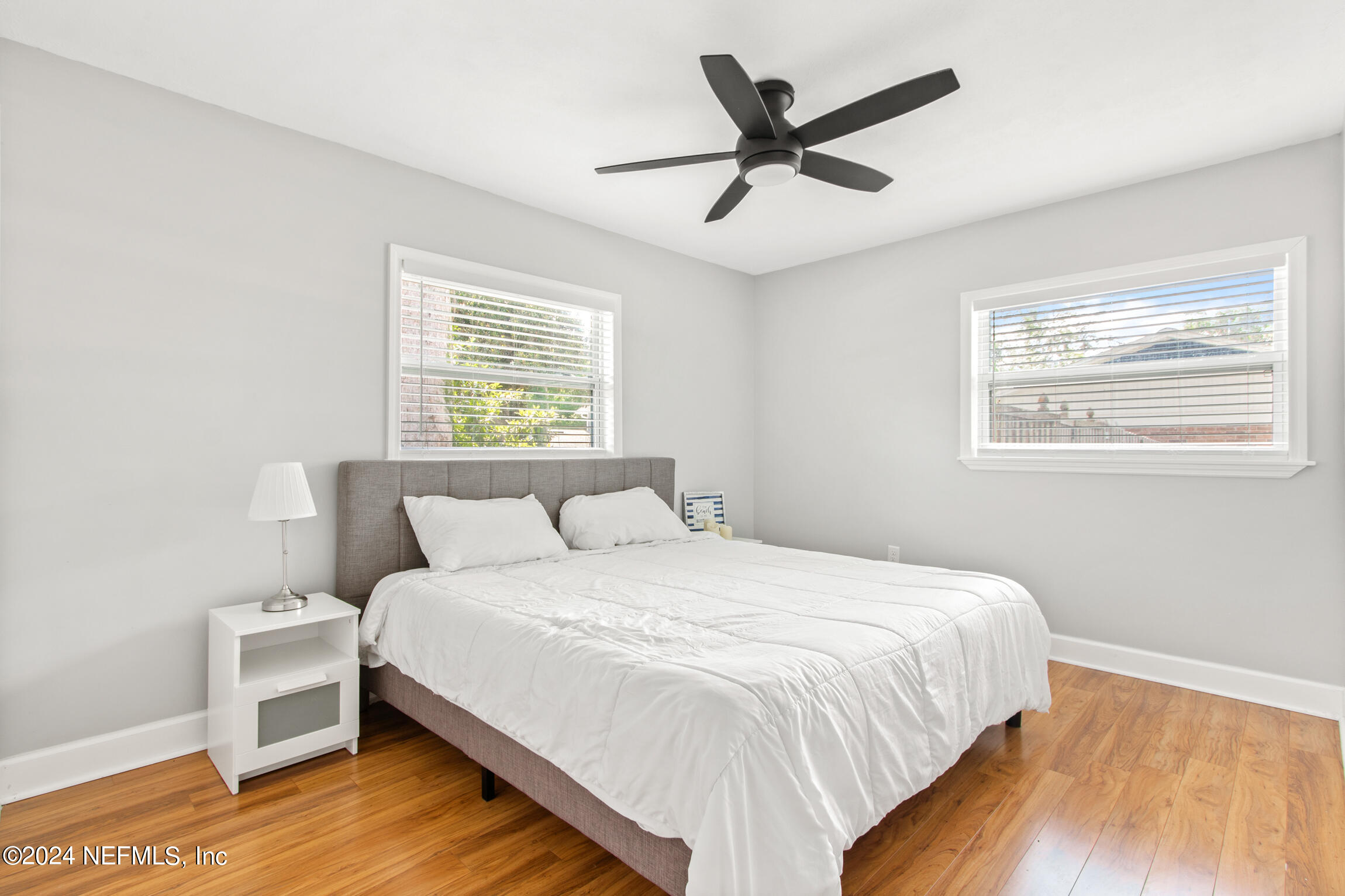 14 Park Terrace Drive St. Augustine, FL 32080 - Photo 26 of 42 a bedroom with a bed and wooden floor