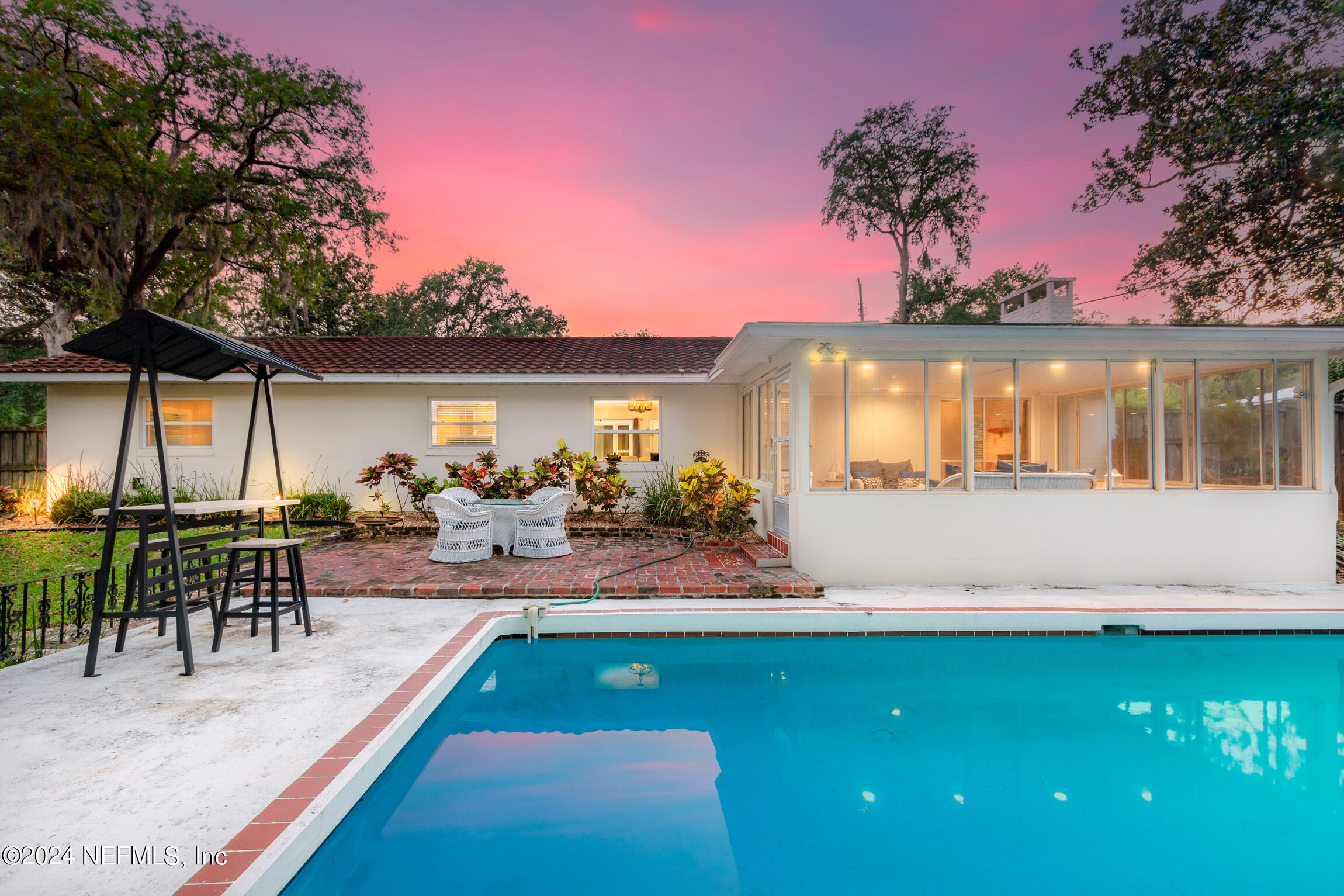14 Park Terrace Drive St. Augustine, FL 32080 - Photo 36 of 42 a view of a chairs and table in patio