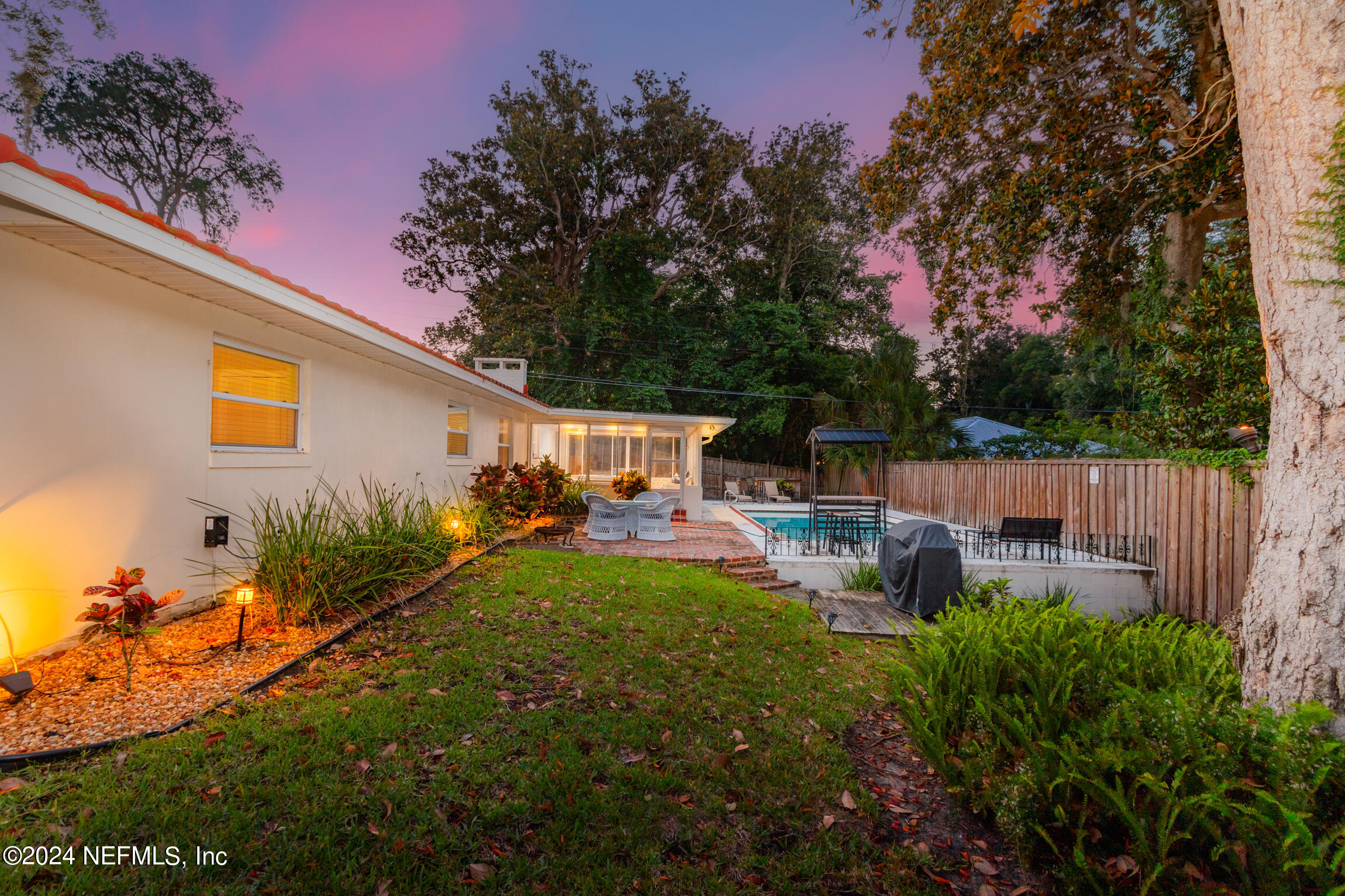 14 Park Terrace Drive St. Augustine, FL 32080 - Photo 38 of 42 a view of backyard of house with green space and seating area