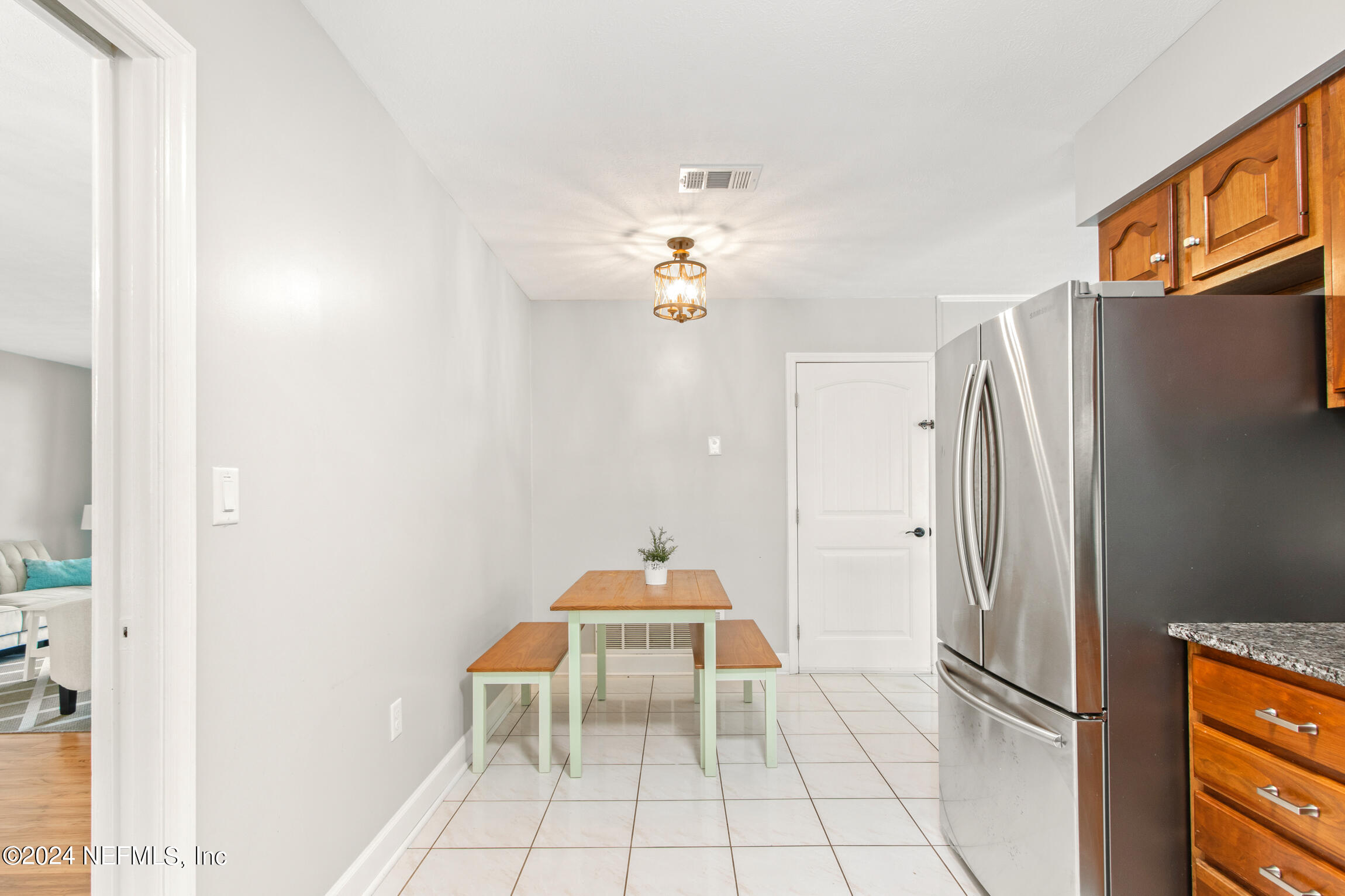 14 Park Terrace Drive St. Augustine, FL 32080 - Photo 10 of 42 a room with stainless steel appliances furniture and a refrigerator