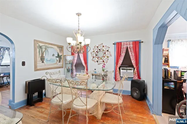 a view of a livingroom with furniture and a window