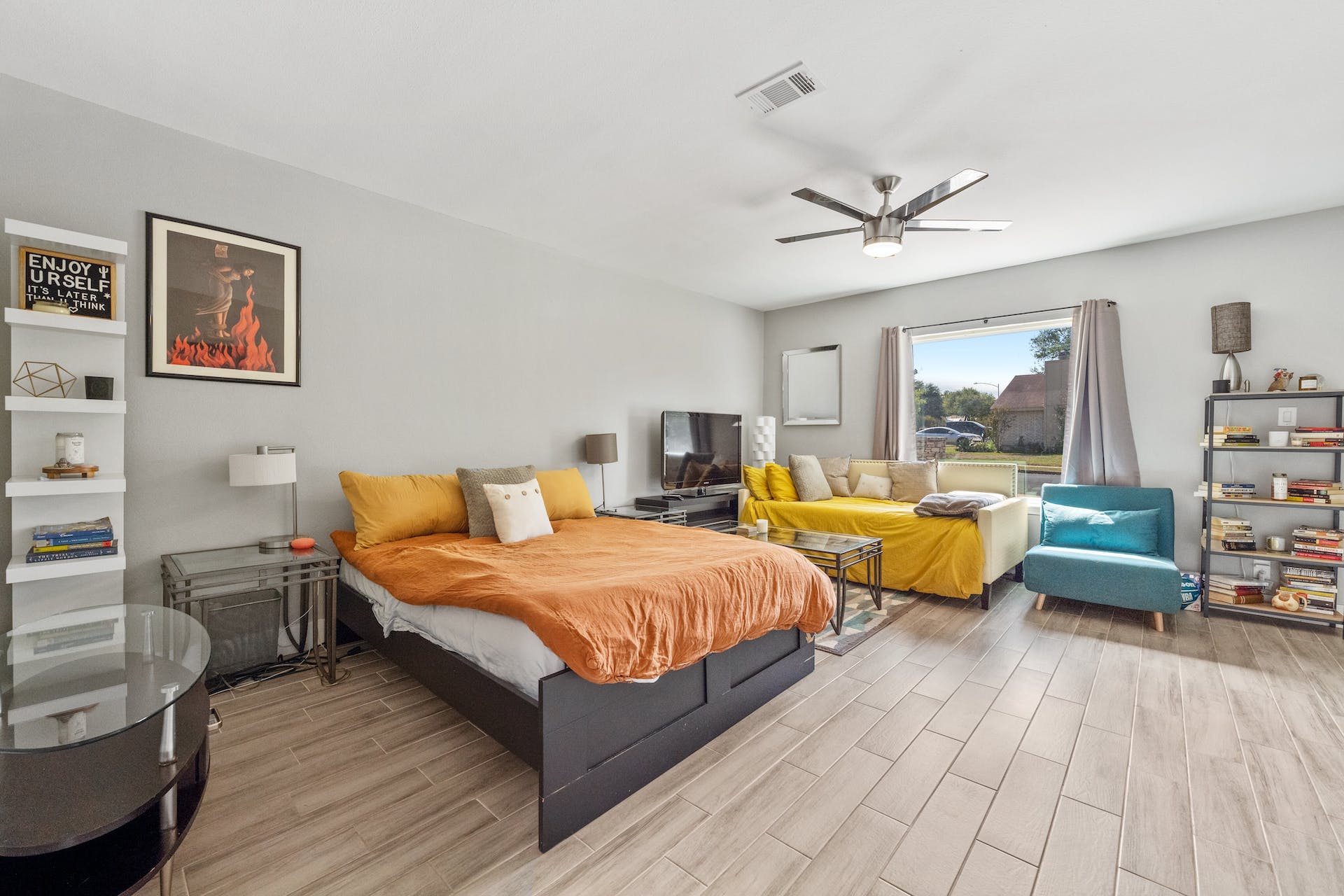1400 Chippeway Lane Austin, TX 78745 - Photo 10 of 24 Bedroom featuring wood finish floors and a ceiling fan