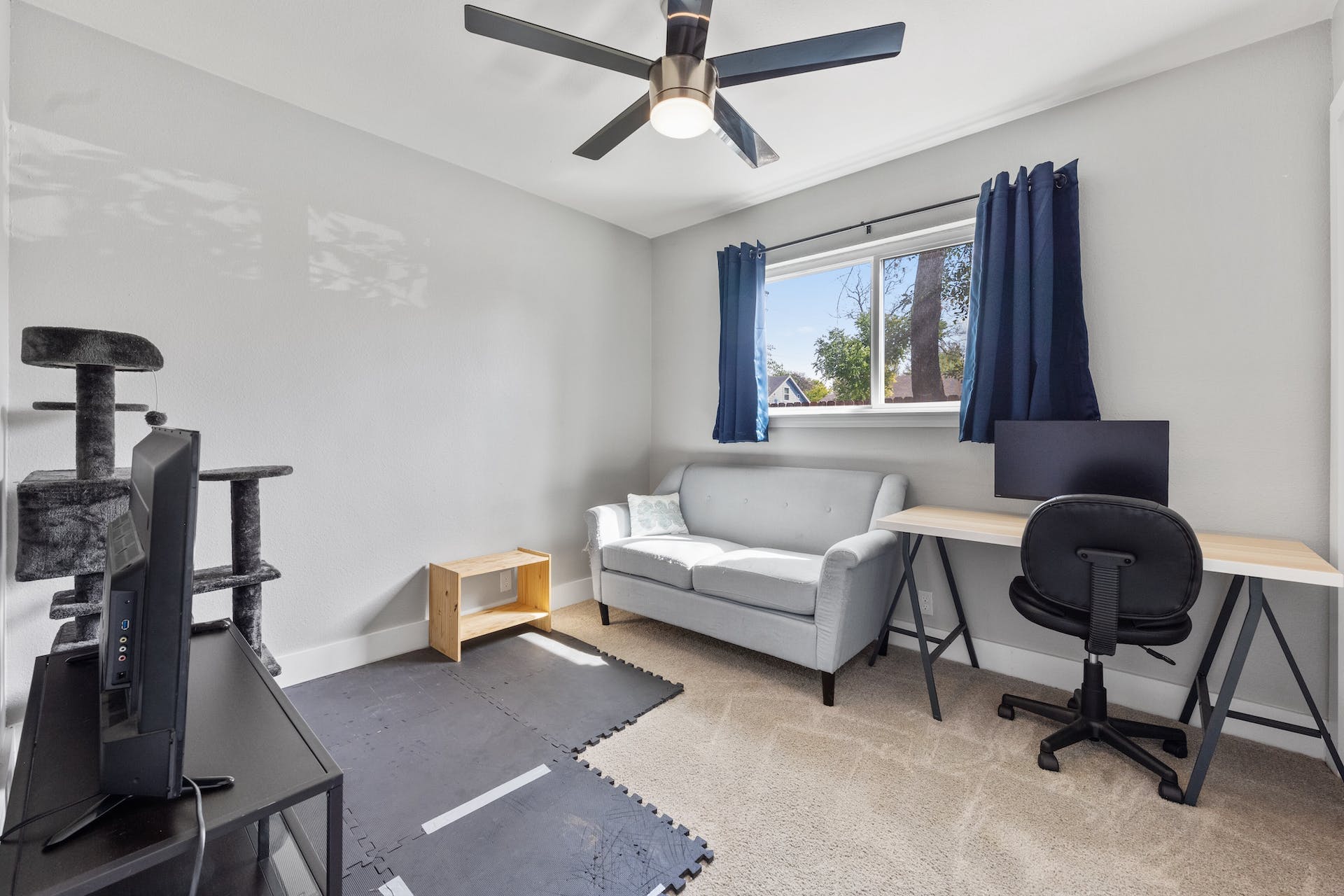 1400 Chippeway Lane Austin, TX 78745 - Photo 17 of 24 Office with a ceiling fan and light carpet