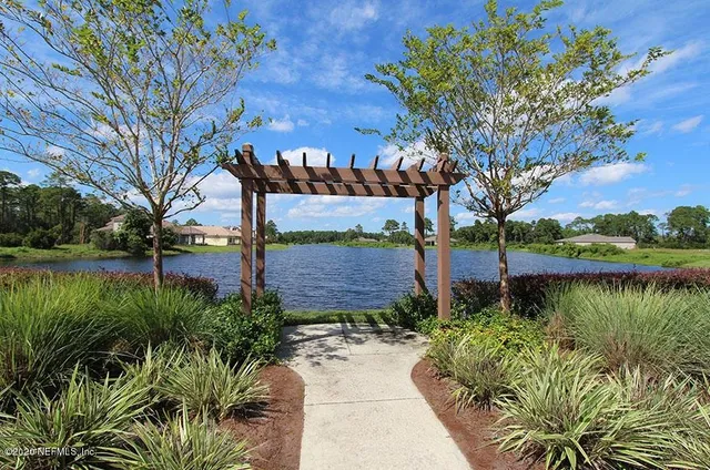 a view of a garden with a bench