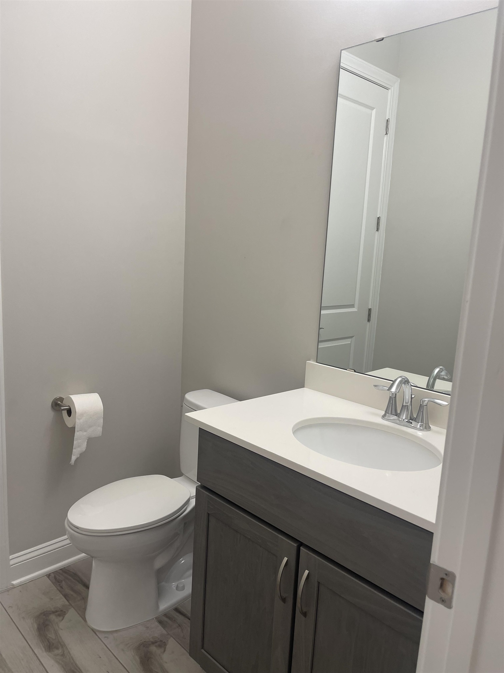 198 Paranza Trace St. Augustine, FL 32095 - Photo 10 of 23 a bathroom with a sink a toilet and mirror