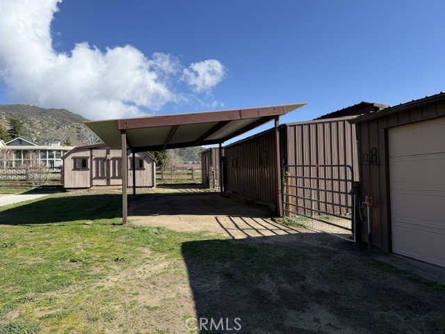 26931 Columbia Way Tehachapi, CA 93561 - Photo 21 of 49 Covered area perfect for an outdoor living area!