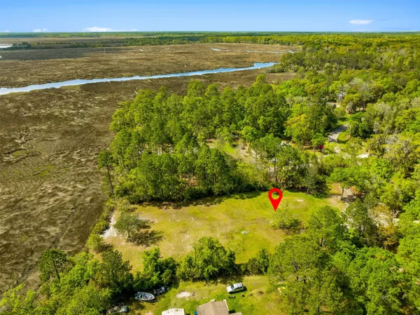 a view of a yard with an outdoor space