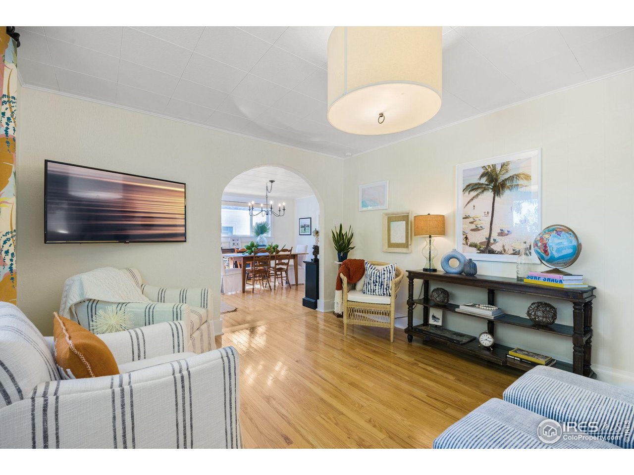 927 5th Street Berthoud, CO 80513 - Photo 14 of 35 a living room with furniture and a flat screen tv