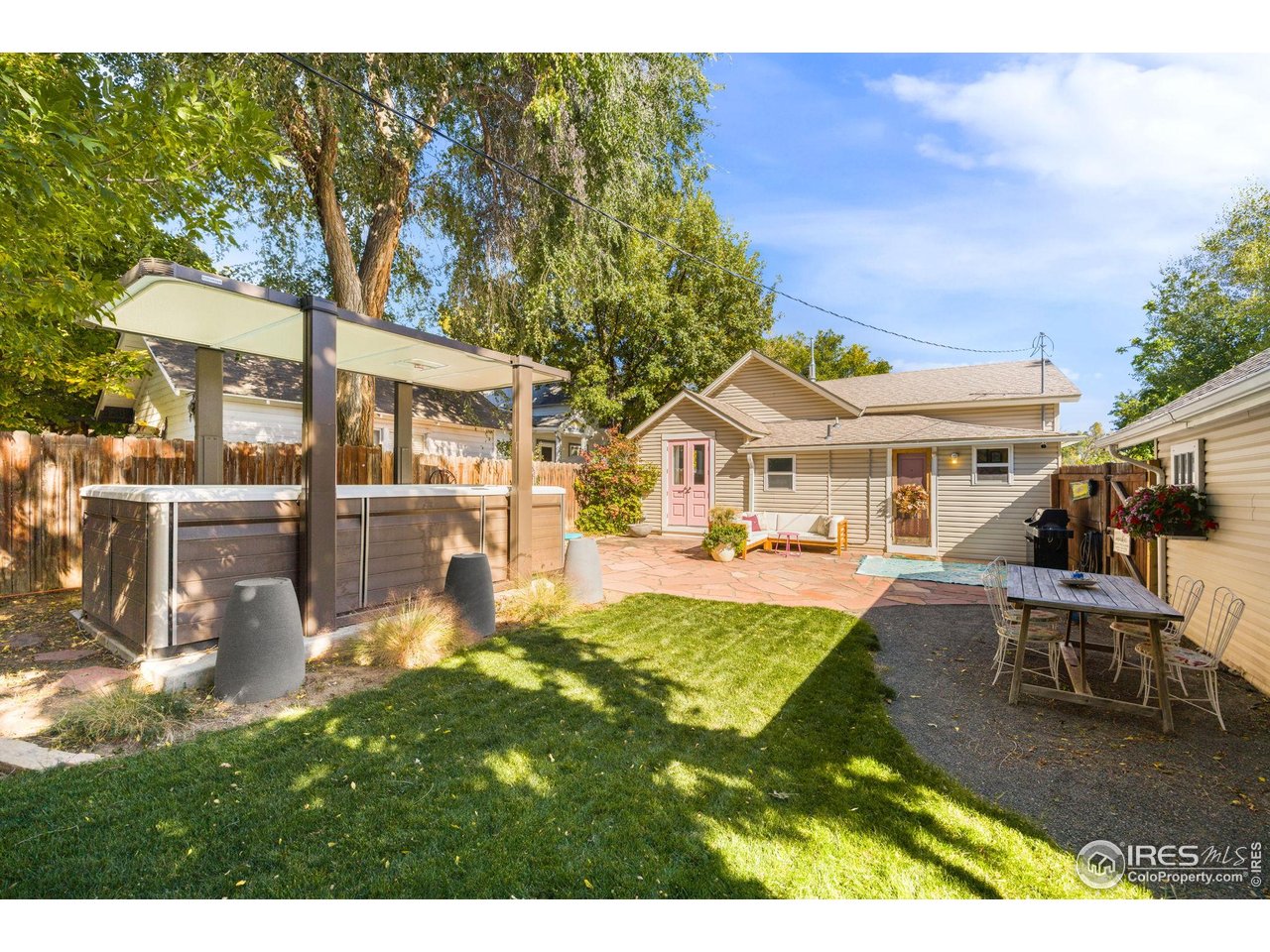 927 5th Street Berthoud, CO 80513 - Photo 26 of 35 a swimming pool view with a seating space