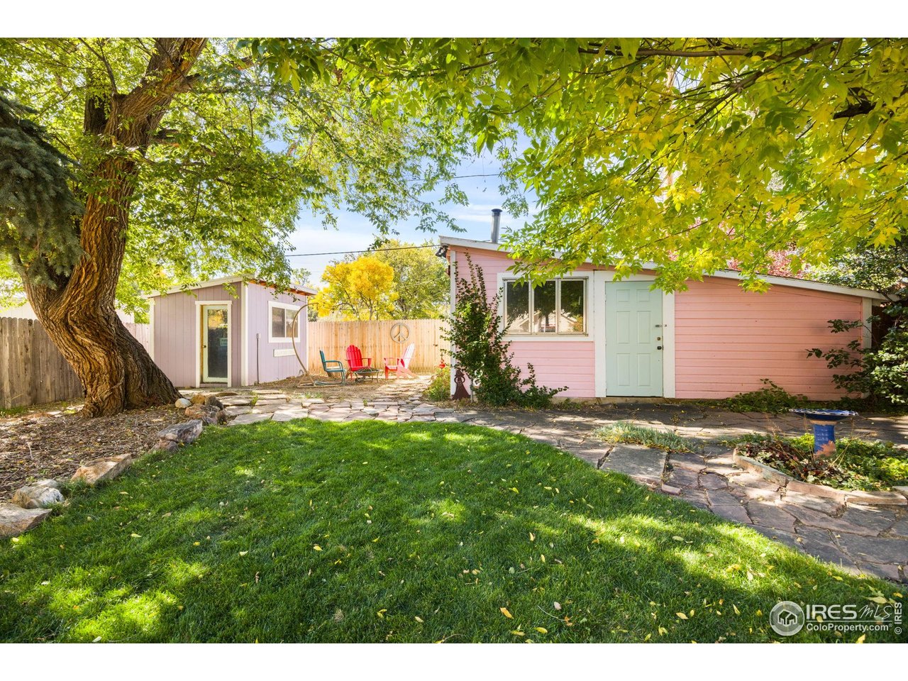 927 5th Street Berthoud, CO 80513 - Photo 30 of 35 a view of backyard of house with green space