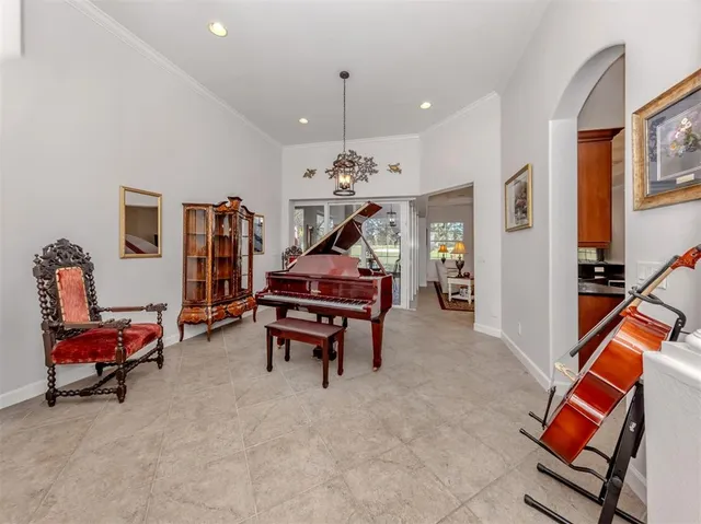 a kitchen with stainless steel appliances granite countertop a refrigerator a stove and a sink