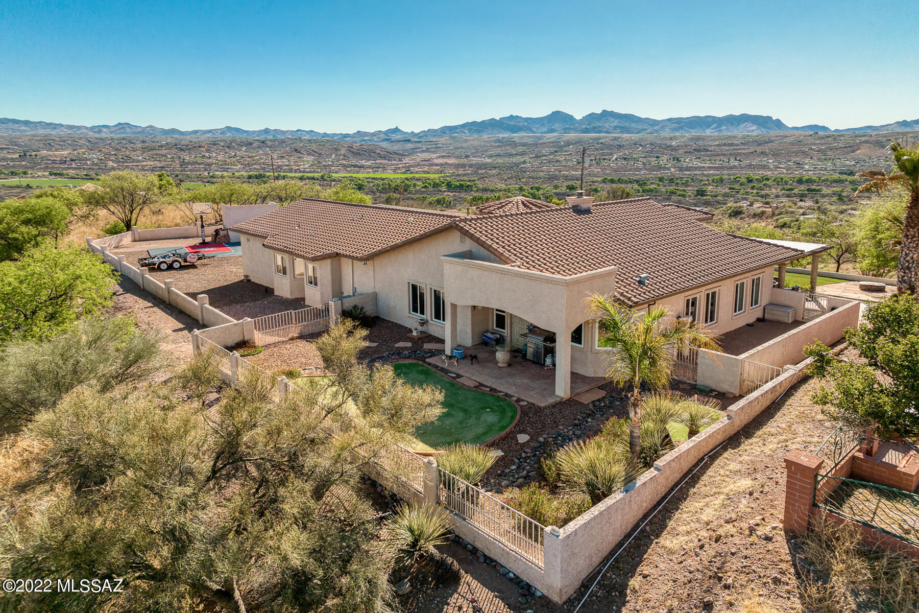 317 Valley View Drive Rio Rico, AZ 85648 - Photo 12 of 49 an aerial view of multiple houses with a lake