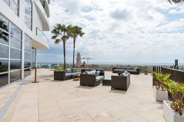 a view of roof with sitting area