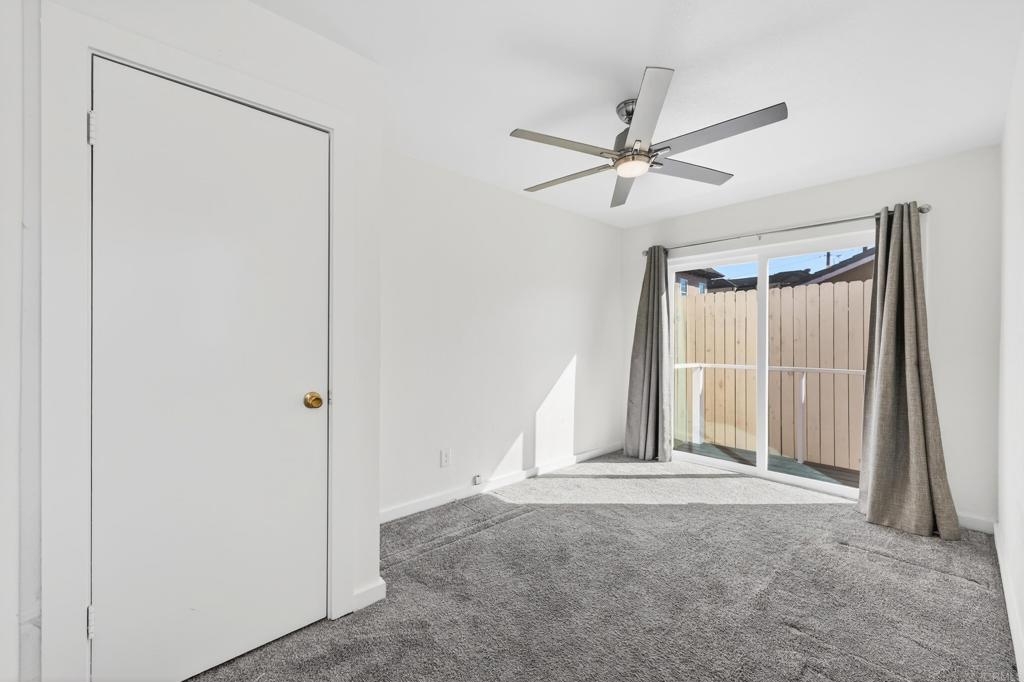 1530 East Appleton Street Long Beach, CA 90802 - Photo 42 of 61 a view of a livingroom with a ceiling fan & window