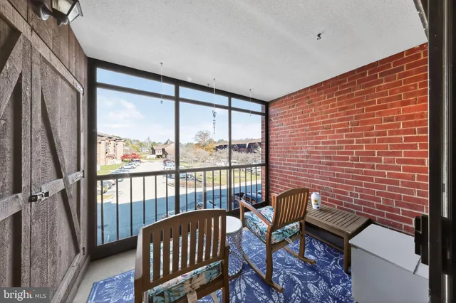 a view of a two chairs in the room