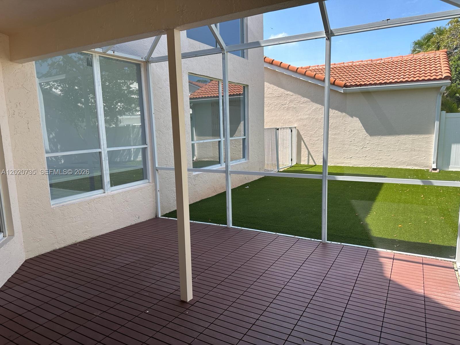 17244 Balboa Point Way Boca Raton, FL 33487 - Photo 25 of 66 a view of outdoor space deck and floor to ceiling window