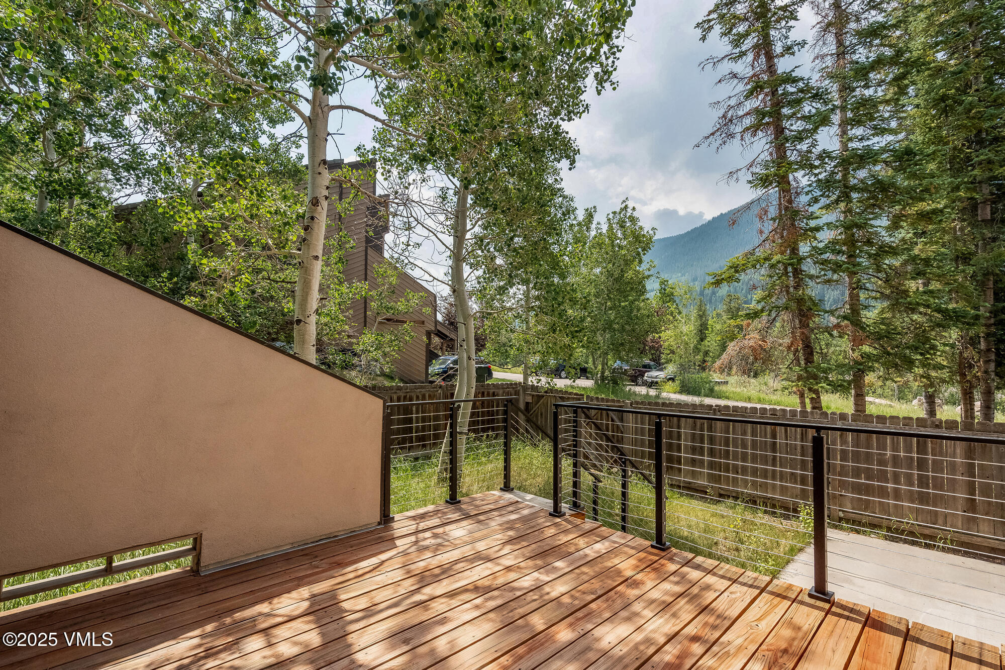 4545 Big Horn Road Vail, CO 81657 - Photo 22 of 49 a balcony with trees in front of it