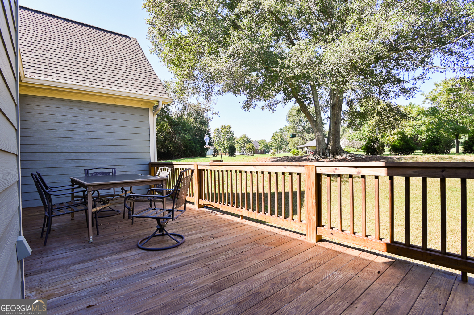 159 Hargrove Circle Winterville, GA 30683 - Photo 25 of 30 a view of backyard with deck and outdoor seating