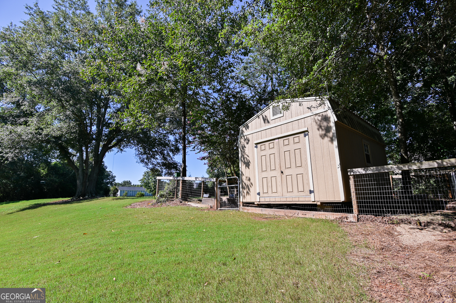 159 Hargrove Circle Winterville, GA 30683 - Photo 28 of 30 a view of backyard with a garden and entertaining space
