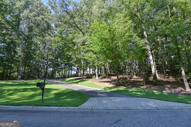 a view of a basketball area in the park
