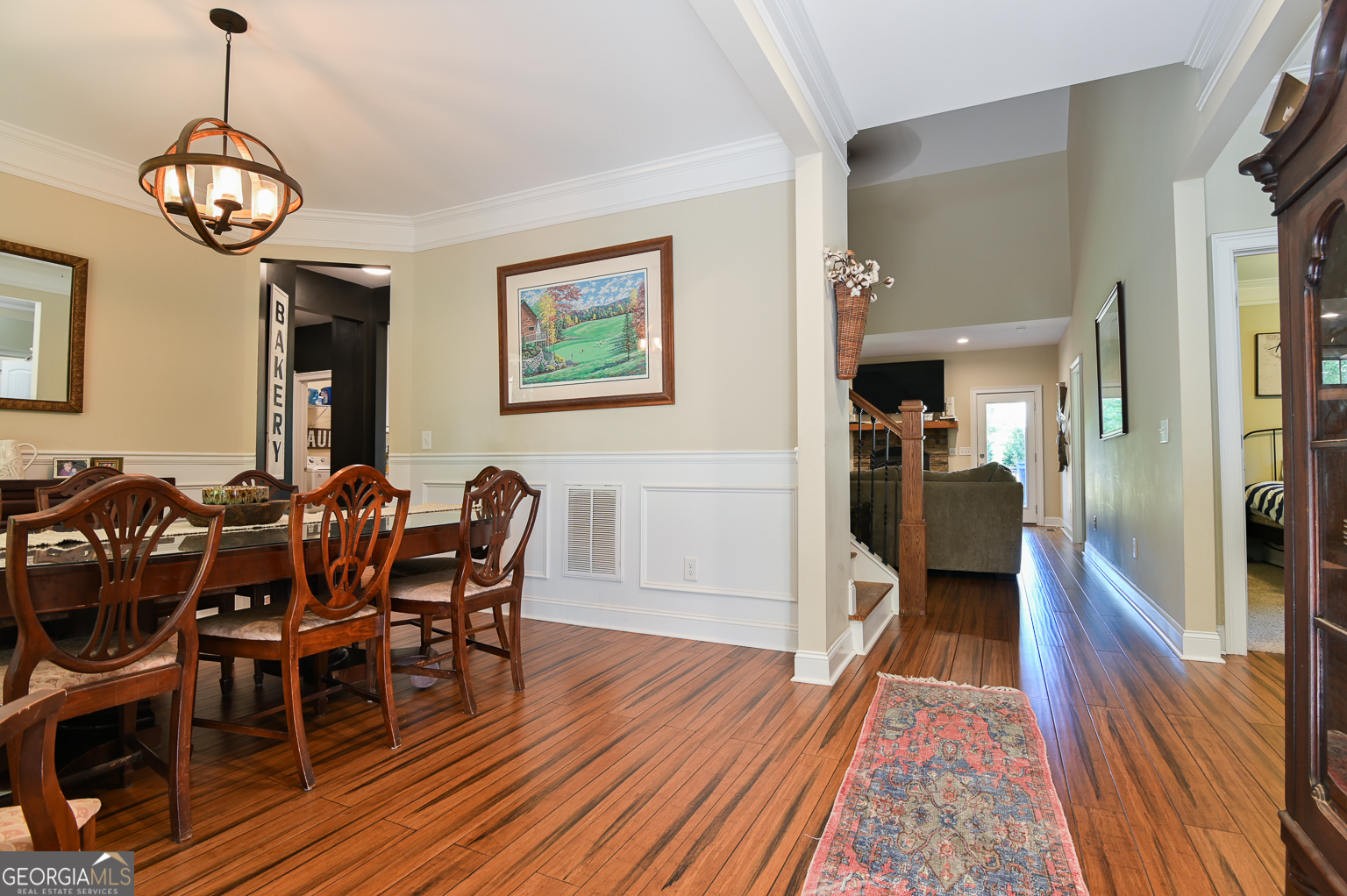 159 Hargrove Circle Winterville, GA 30683 - Photo 7 of 30 a view of a dining room with furniture wooden floor and chandelier