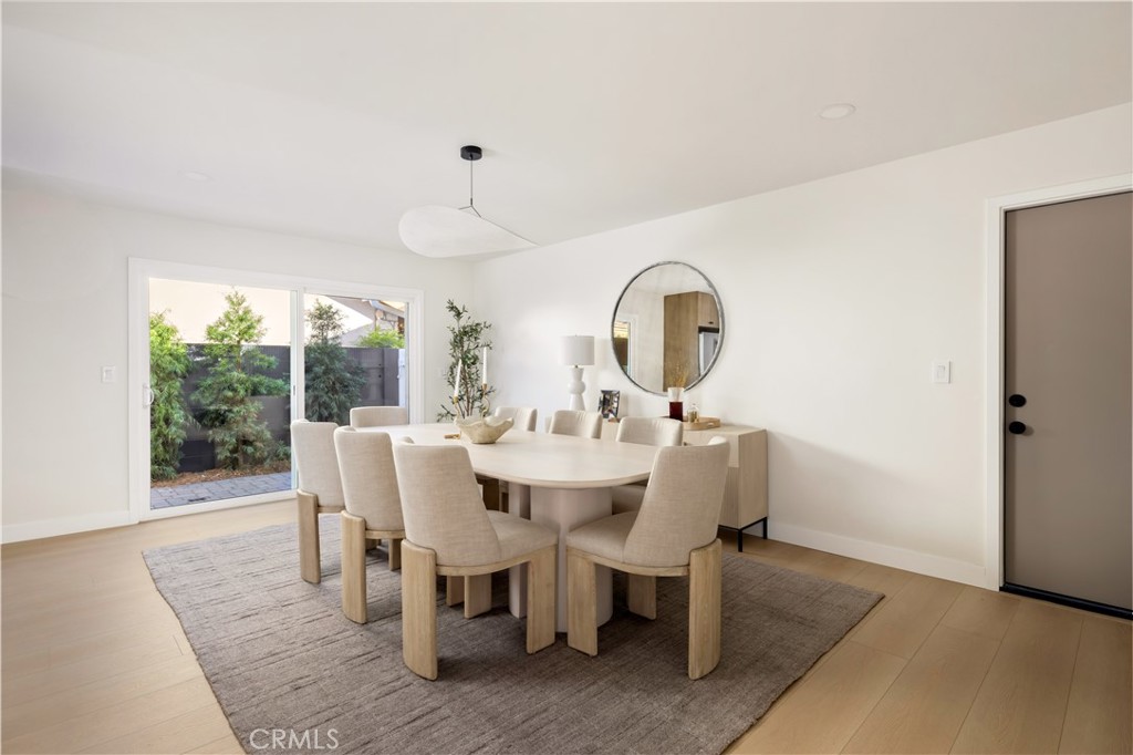 17841 Lucero Way Tustin, CA 92780 - Photo 16 of 39 a view of a dining room with furniture window and outside view