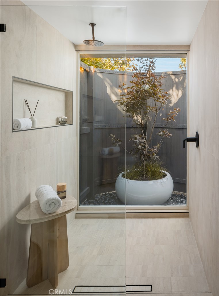 17841 Lucero Way Tustin, CA 92780 - Photo 23 of 39 a bathroom with a bathtub and a shower