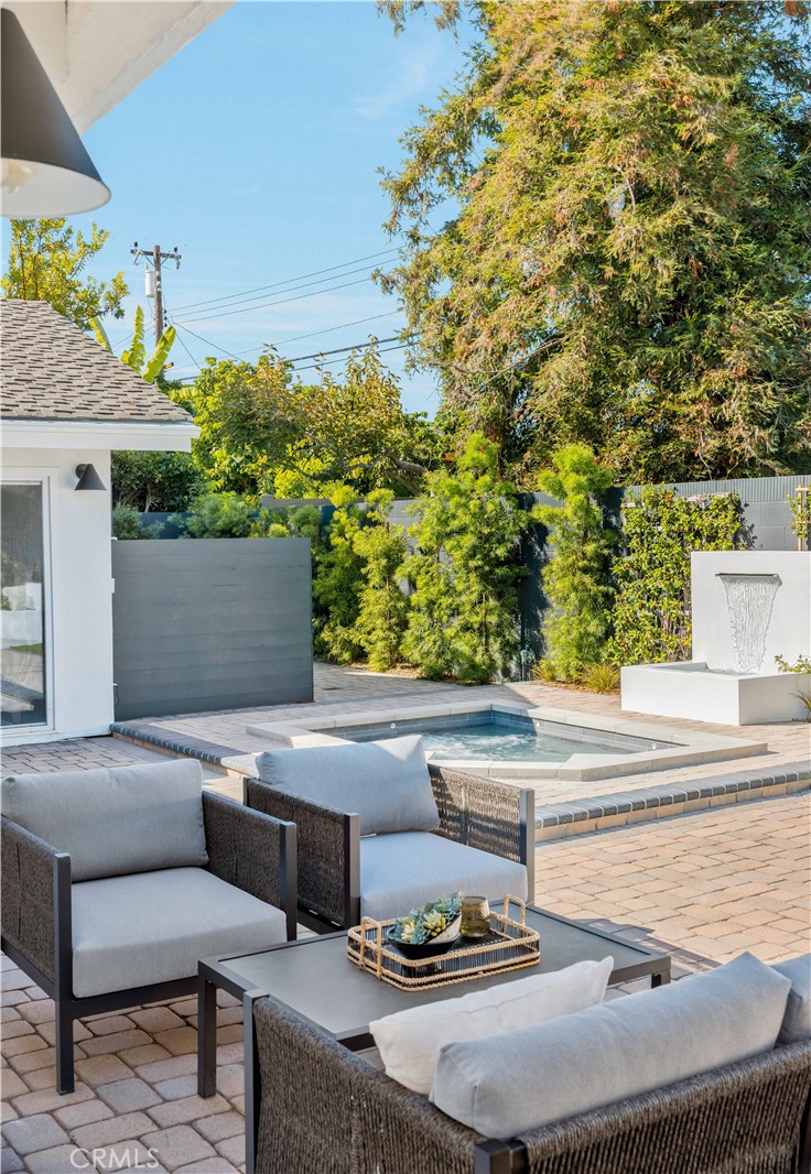 17841 Lucero Way Tustin, CA 92780 - Photo 31 of 39 a backyard of a house with table and chairs