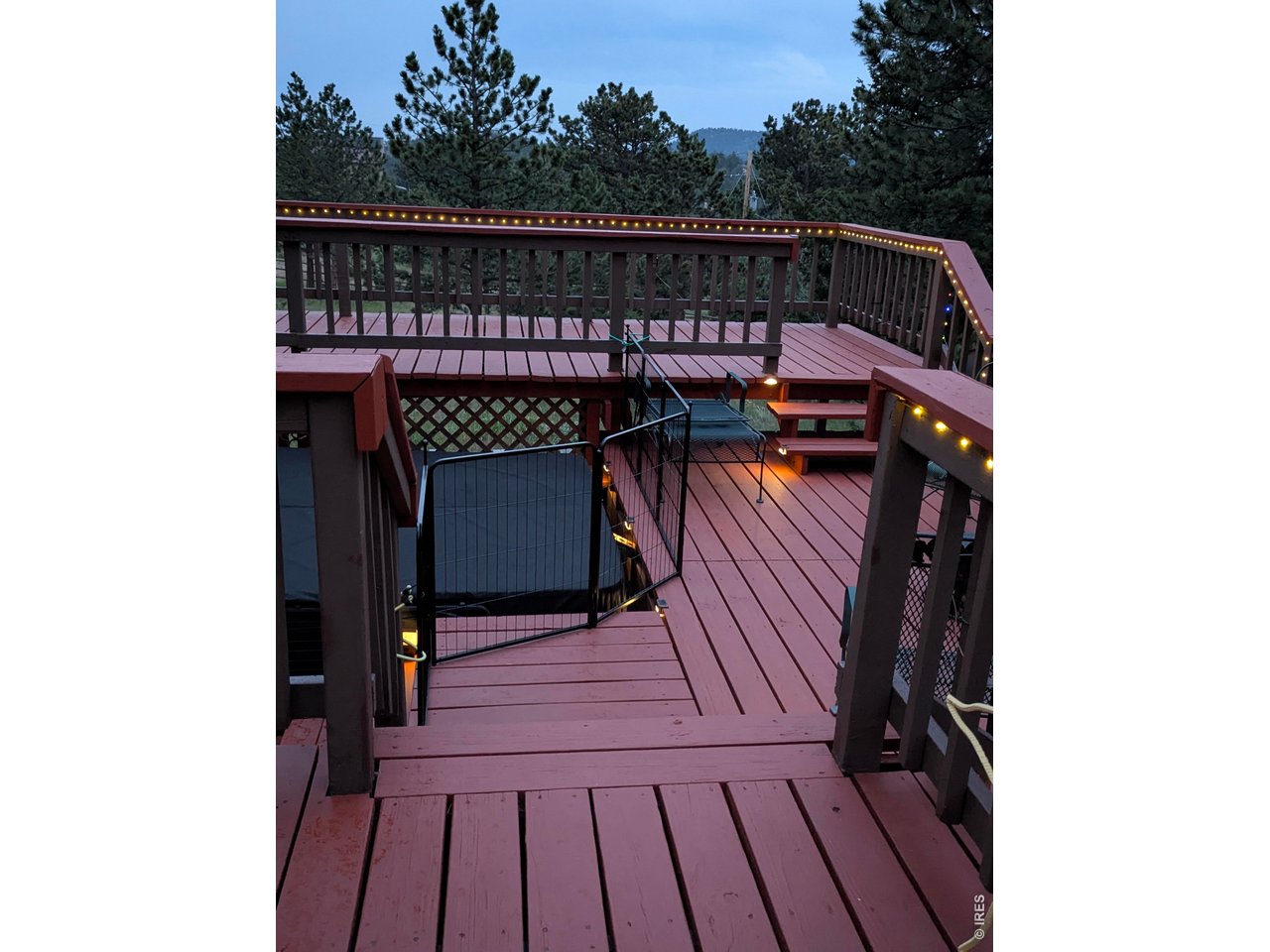 636 Ranch Road Ward, CO 80481 - Photo 17 of 32 Evening on the expansive deck...