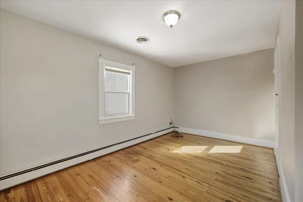 a view of a hallway view with staircase