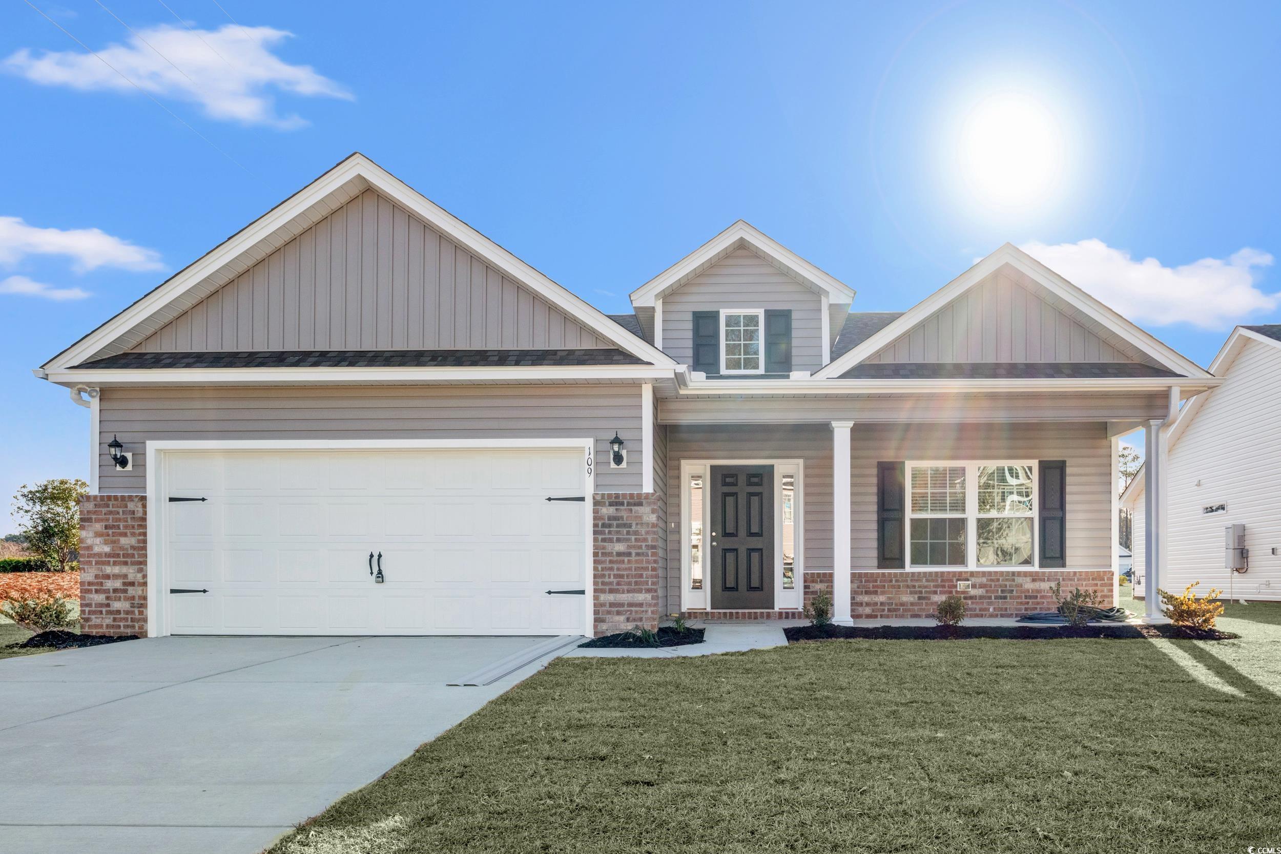 109 Lakota Loop Longs, SC 29568 - Photo 1 of 20 Craftsman-style house with a garage and a front la