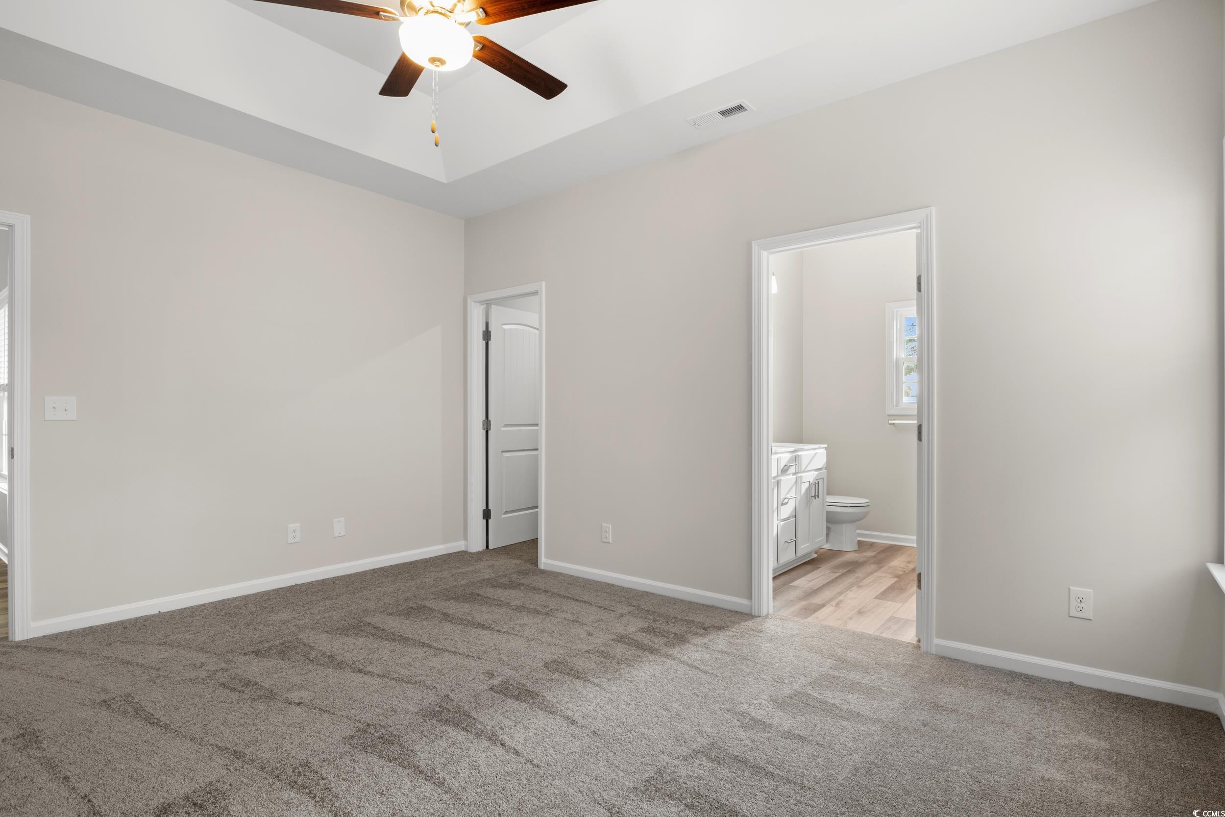 109 Lakota Loop Longs, SC 29568 - Photo 11 of 20 Unfurnished bedroom with ceiling fan, light carpet